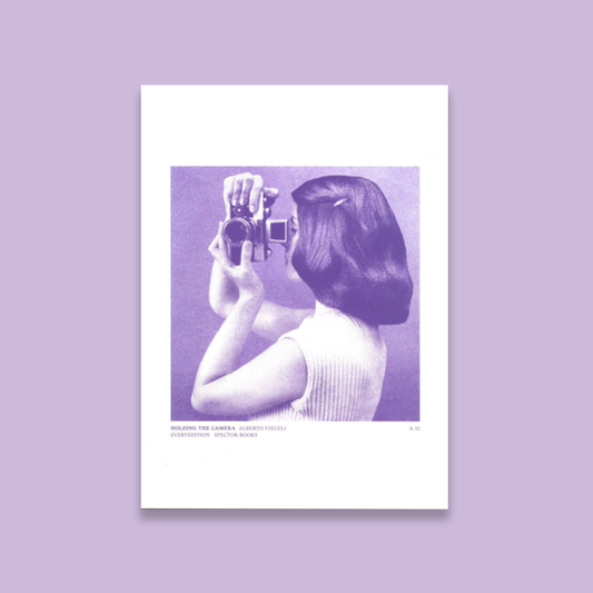 Holding the Camera /anglais